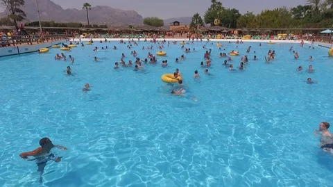 Having fun at the Swimming Pool with Drone Stock Footage 90374350