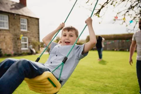 Having Fun on the Swing Fotos Stock
