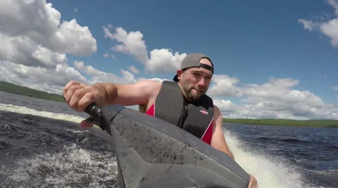 Having fun on the water - jet ski action on summer vacation Stock Footage 64758421