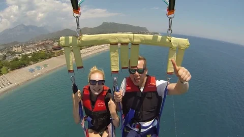 Having fun with water parachute Stock Footage 72377445