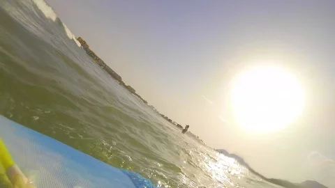 Having fun while bodyboarding during summer Stock Footage 104306207