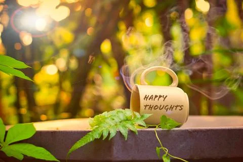 Having fun while enjoying a cup of hot coffee falling outdoor Stock Photos