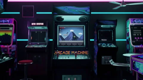 Having fun while playing the old video game mission on the arcade machine Stock Footage 256591725