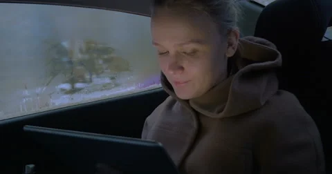 Having good time with pad during car travel Stock Footage 51602552