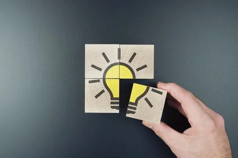 Having an idea or finding solutions concept, glowing light bulb symbol on wooden 스톡 사진