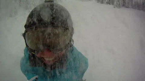 Having lots of fun Snowboarding on a Ski Resort at Canadian Mountains Stock Footage 22478254