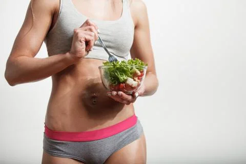 Having lunch with vegetable salad Stock Photos