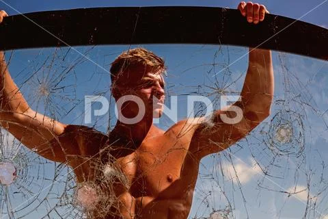 Having plenty of drive and ambition. Sport man with muscular strength. Achieving Stock Photos