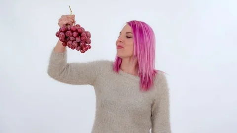 Having red grapes for a snack Video stock 83724885