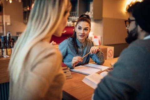 Having their classes in a cafe Stock Photos