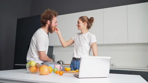 Having a video call using laptop young couple talking to their parents far away Stock Footage 164377535