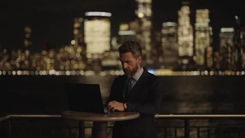 Having virtual meeting. Freelancer developer typing program code outdoor Stock Footage 274869837