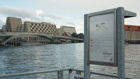 Havnegade bathing zone water quality sign at Copenhagen Inderhavnsbroen bridge Stock Footage 345588836