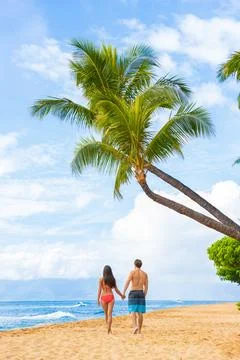 Hawaii beach couple walking on Kaanapali Maui Hawai travel. Two adults tourist Stock Photos