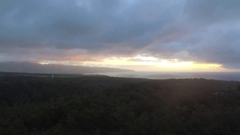 Hawaii Drone Fly Over Sunset Forest Wind Turbine Cloudy Sky 動画素材 78558711