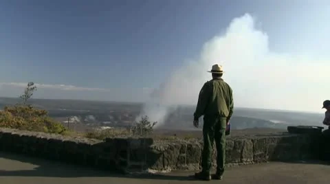 Hawaii, lava flow patterns, Park ranger watching Kilauea summit Video stock 10766683