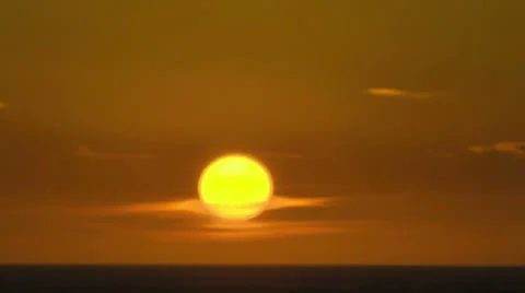 Hawaii Sun Rising From the Sea into Clouds Time Lapse Stock Footage