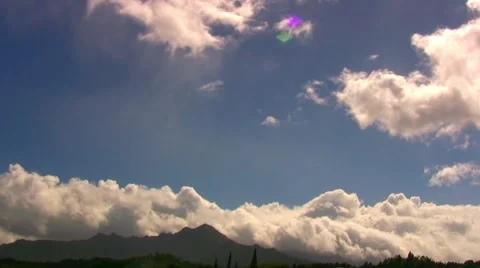 Hawaii timelapse of clouds over distant mountain Stock Footage 1027993