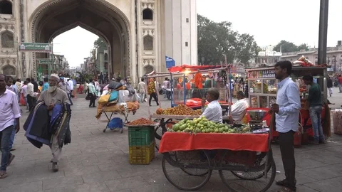 Hawkers at Charminar  Stock Footage 103310657