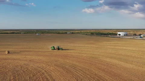 Hay Bailing in west Texas Stock Footage 247988261