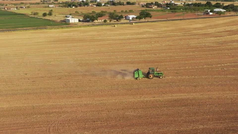 Hay Bailing in west Texas Stock Footage 247988896
