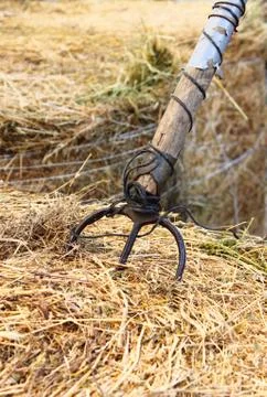 Hay bale with hayfork Stock Photos