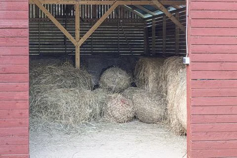 Hay bales in a barn. Stock Photos
