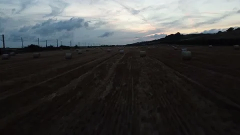 Hay bales low level drone footage, 4K UHD Stock Footage 169478940