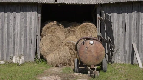 Hay bales in old shed Stock Footage 60659335
