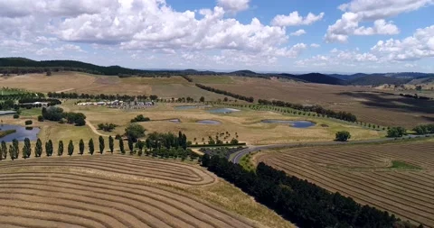 Hay circles on harvested fields of Central tablelands of Australia Oberon 4k. Stock Footage 159570963