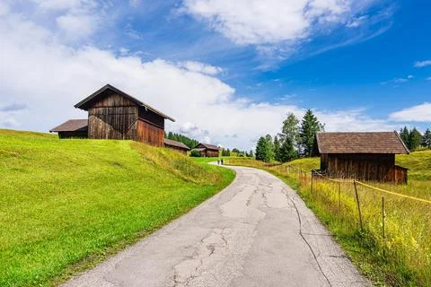 Hay huts in the Humpback Meadows between Mittenwald and Kruen, Germany Stock Photos