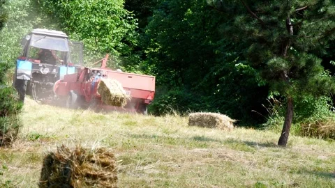 Hay making with a tractor Stock Footage 249526639