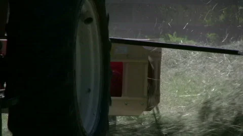 Hay racking with a tractor Stock Footage 477714