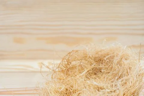 Haystack with copy space on wooden background Stock Photos