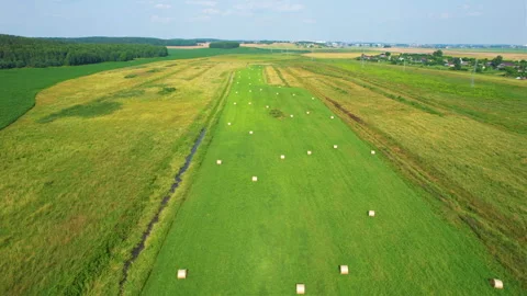 Haystack field. Hay bale from residues grass. Видео 167036977