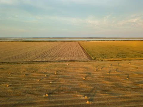 Haystack in the Field at Sunset. Aerial View Stock Photos
