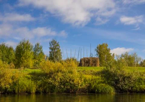 Haystack at the meadow Stock Photos