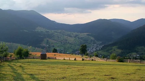Haystack on a mountain slope Stock Footage 94963348
