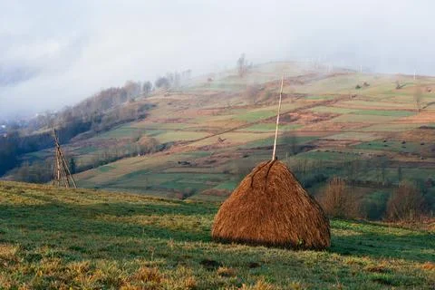 Haystack in a mountain village Stock Photos