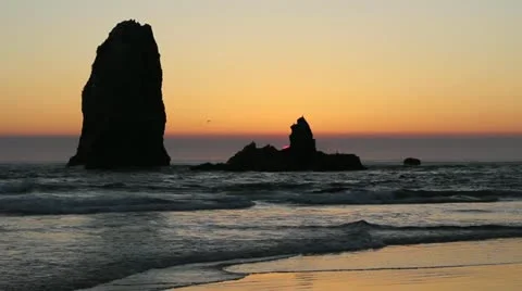 Haystack Needles Rock in Canon Beach along Oregon Coast at Sunset 1080p Stock Footage 12110190