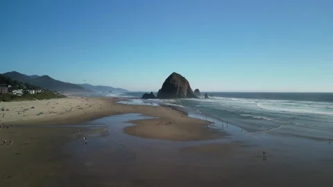 Haystack Rock and Cannon Beach with People, Aerial Stockbeeldmateriaal 348416792
