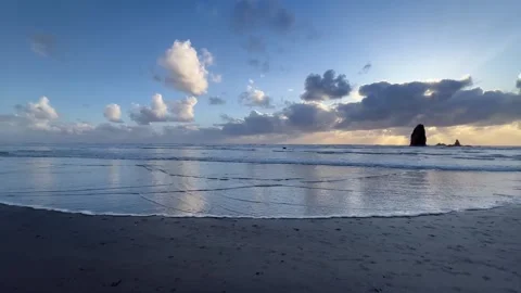 Haystack Rock and Low Tide Waves at Cannon Beach Oregon Stock-Footage 346984990
