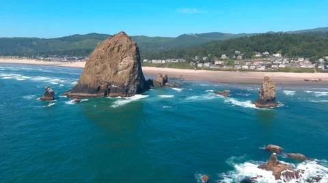 Haystack Rock Beach and Mountains Stock Photos