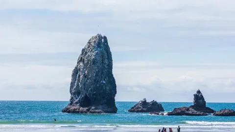 Haystack Rock on Cannon Beach Oregon – 235-Foot Sea Stack, Prominent Landmark an Stock Footage 309278087