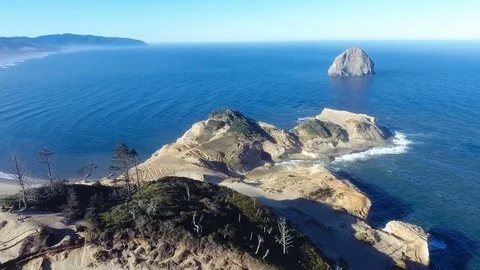 Haystack rock cliffs water Stock Footage 81766594