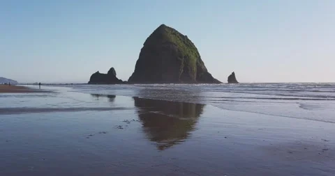 Haystack rock mid day with reflection. Stock Footage 276989482