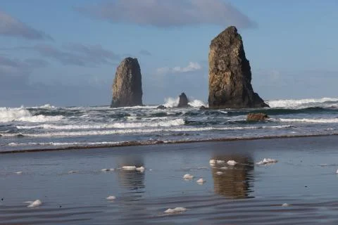 Haystack Rock in the morning sun Stock Photos