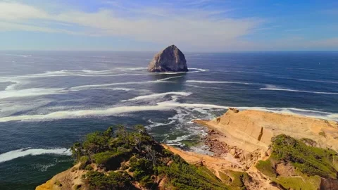 Haystack Rock Rising Above the Blue Pacific Ocean Stock-Footage 341645763