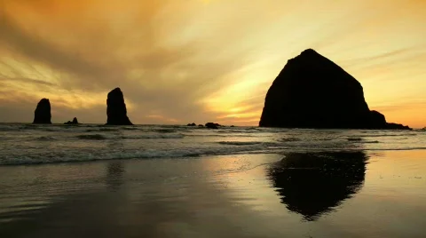 Haystack Rock at Sunset in Cannon Beach Along the Oregon Coast Stock Footage
