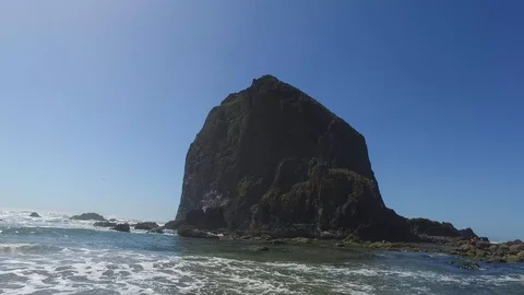 Haystack Rock from the water Stock Footage 92451579